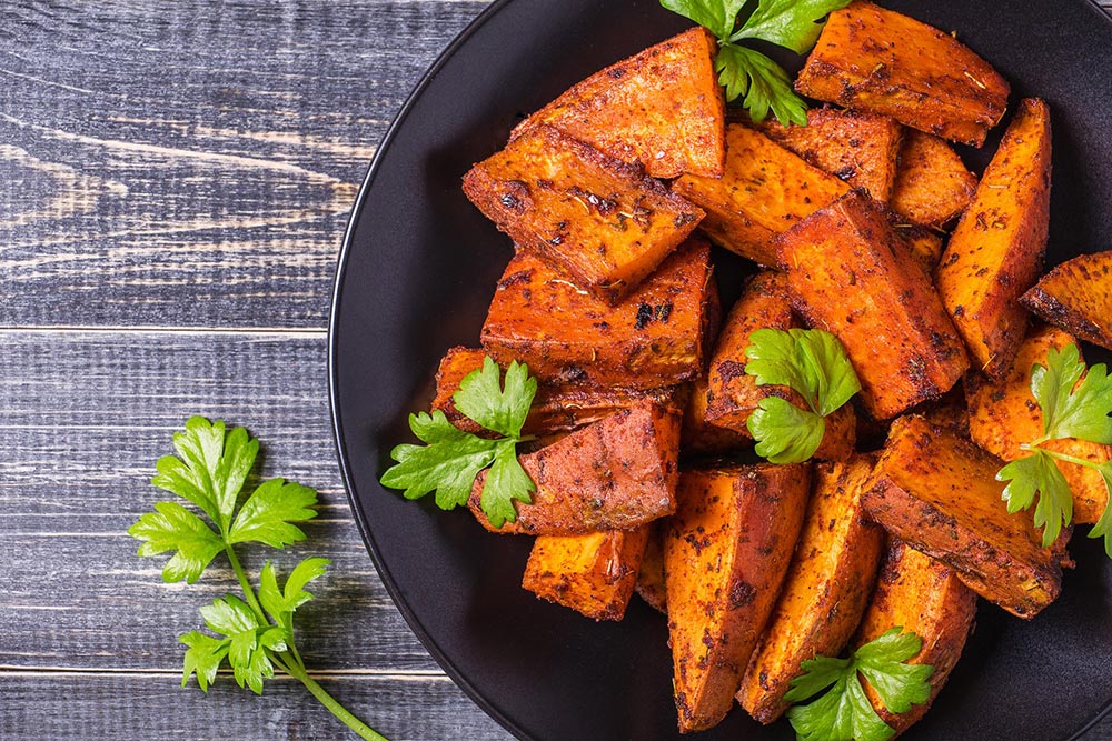 A bowl of roasted sweet potato.