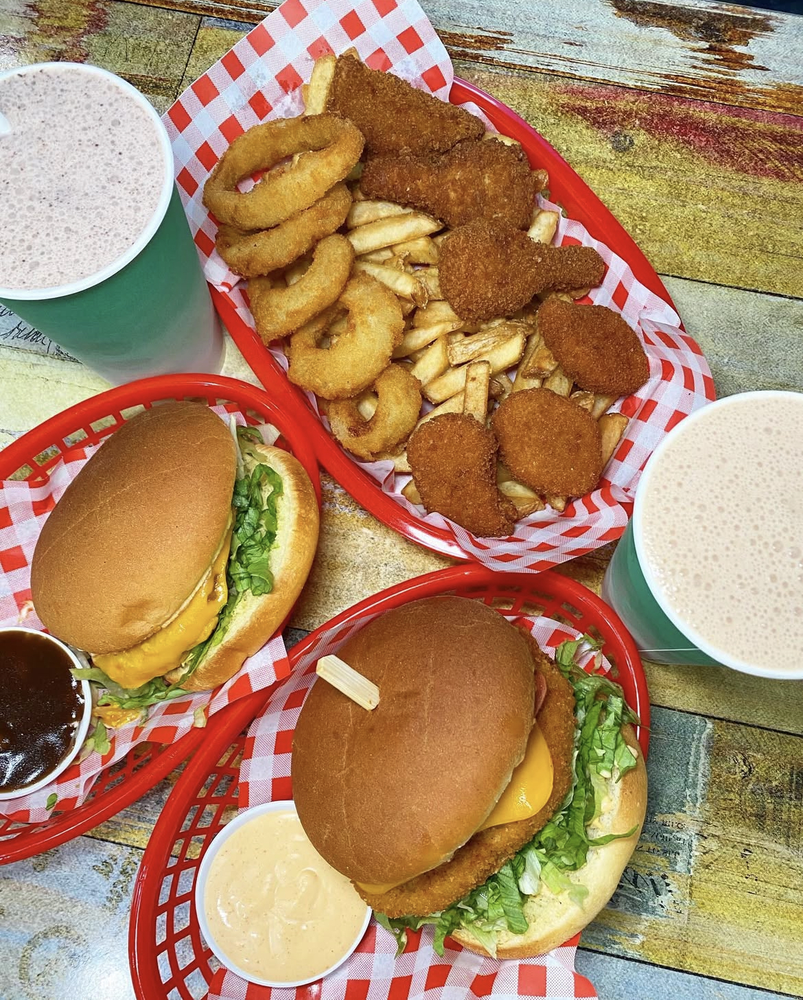 A mouth-watering spread of vegan burgers, fries, onion rings, nuggets and milkshakes from Lord of the Fries.