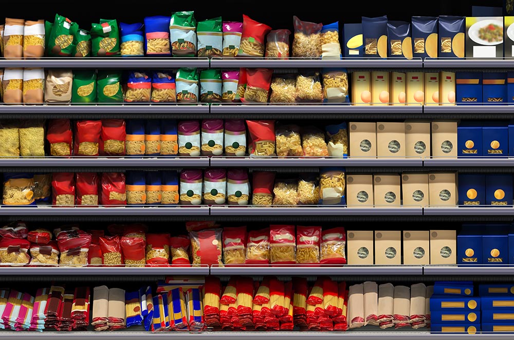 A front view of a supermarket shelving unit full of pasta.