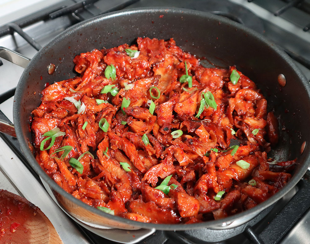 A pot of Bourbon Chicken made with seitan.