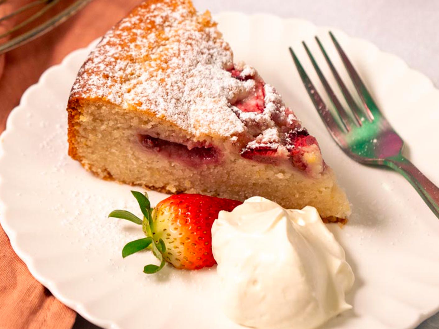 Close up of a slice of vegan Strawberry Tea Cake