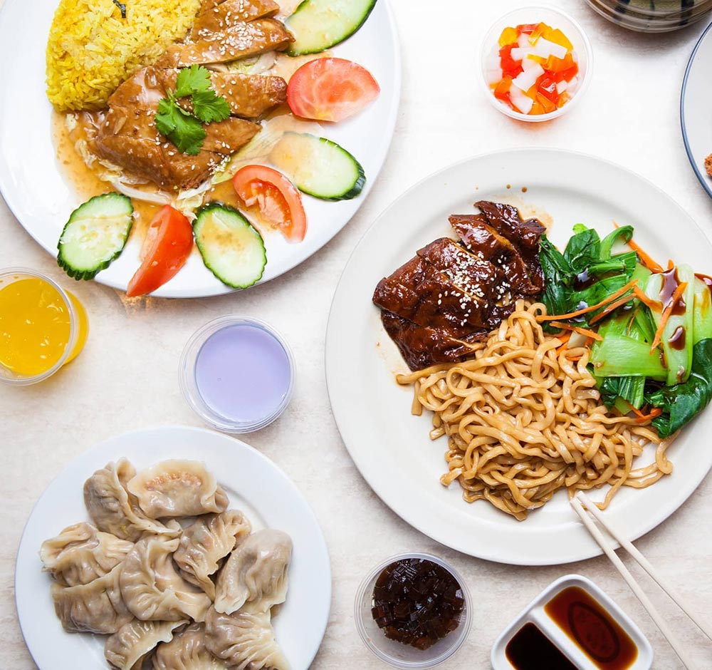 An overhead shot of a plant-based spread at Tea Master Vegetarian Cafe,