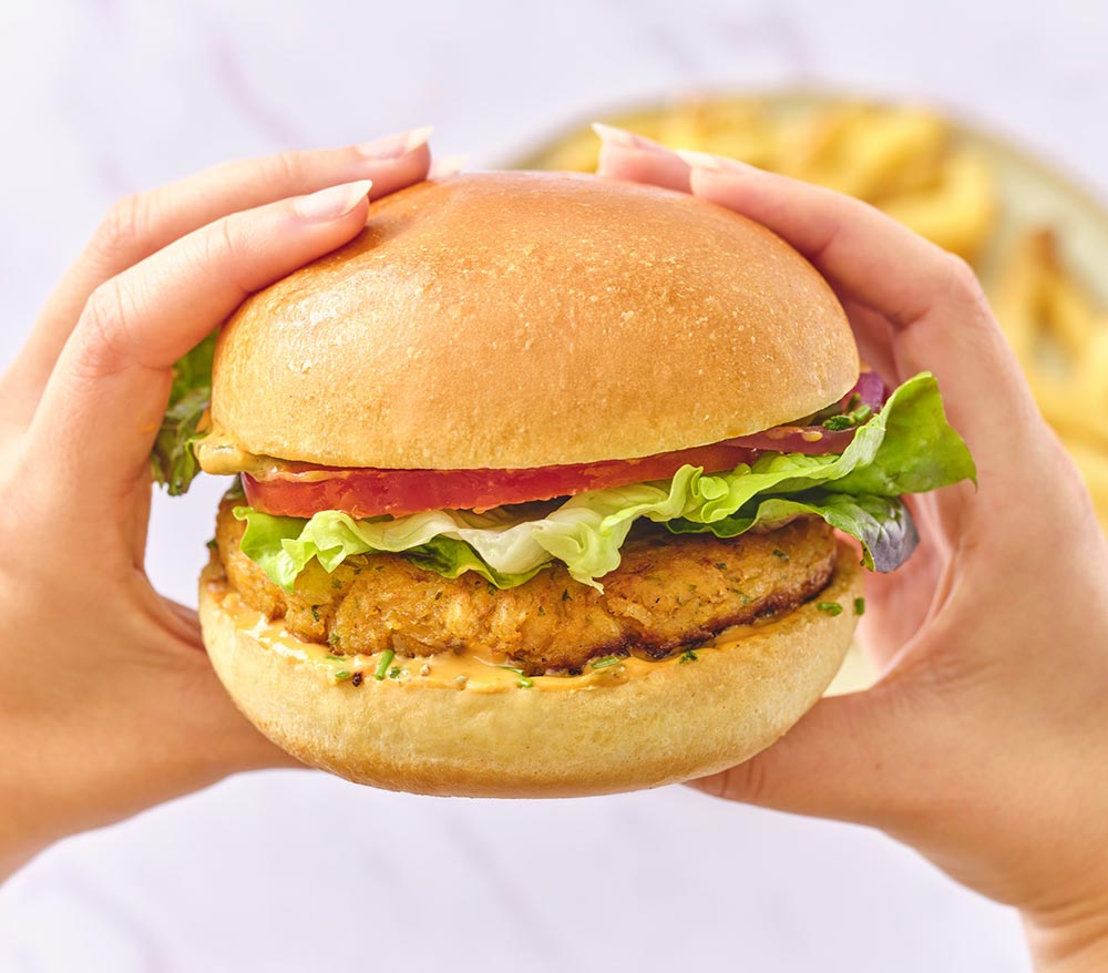 A plant-based burger patty served on a Brioche Gourmet plant-based bun. 