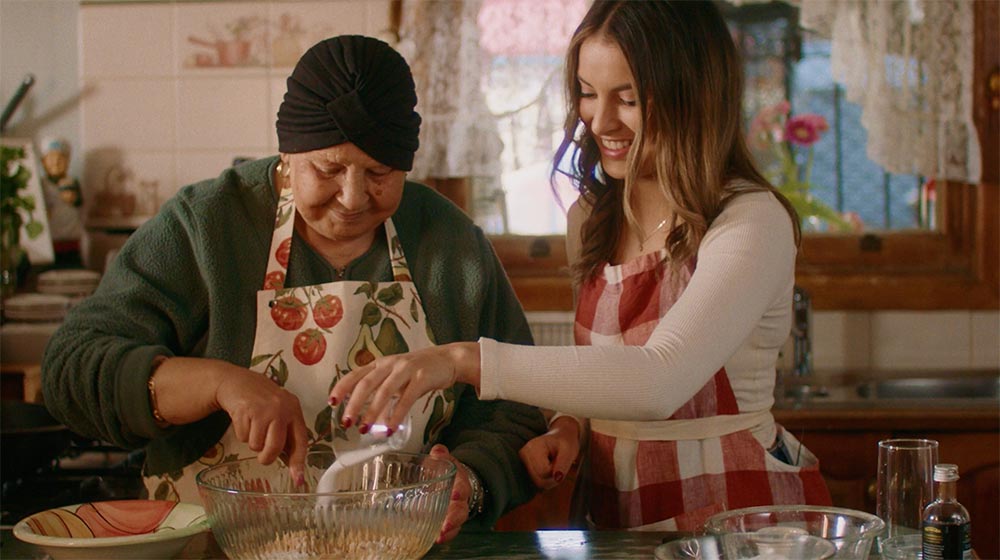 Nanna Mirella and Claudia in the kitchen making dessert together. 