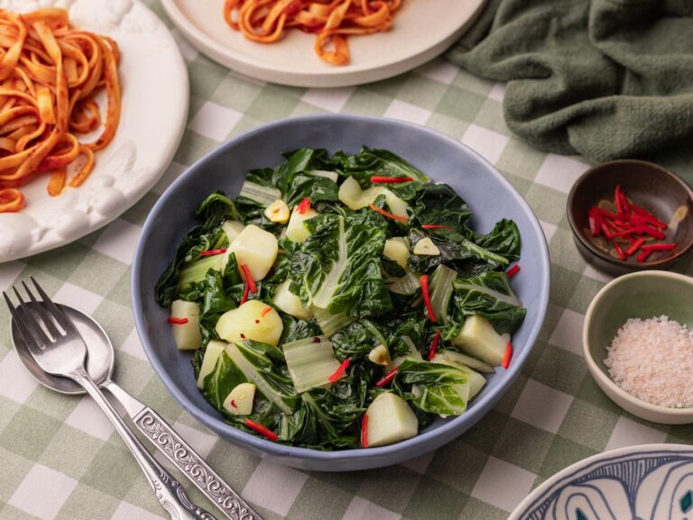 A bowl of sauteed potato and silverbeet