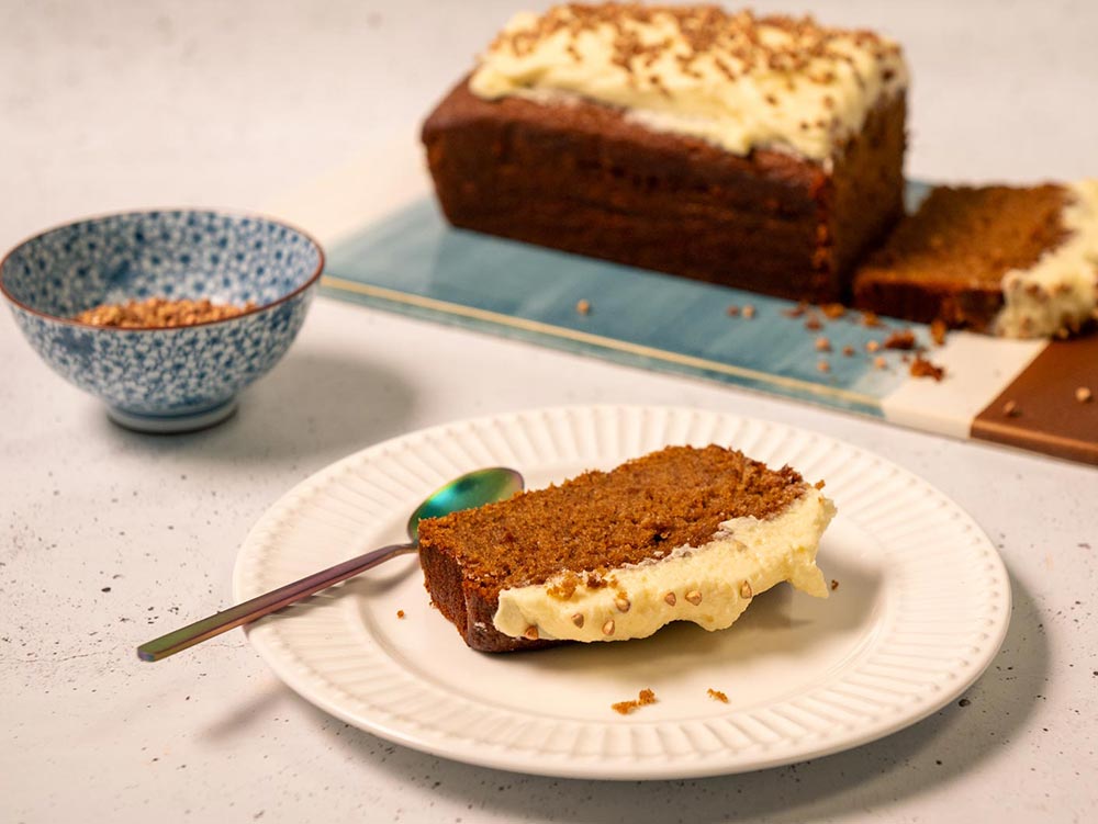 A spiced treacle loaf cake with frosting. 